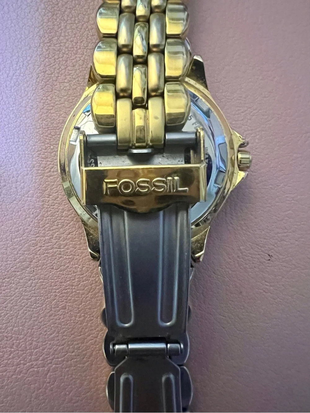 Ladies gold Fossil bracelet watch